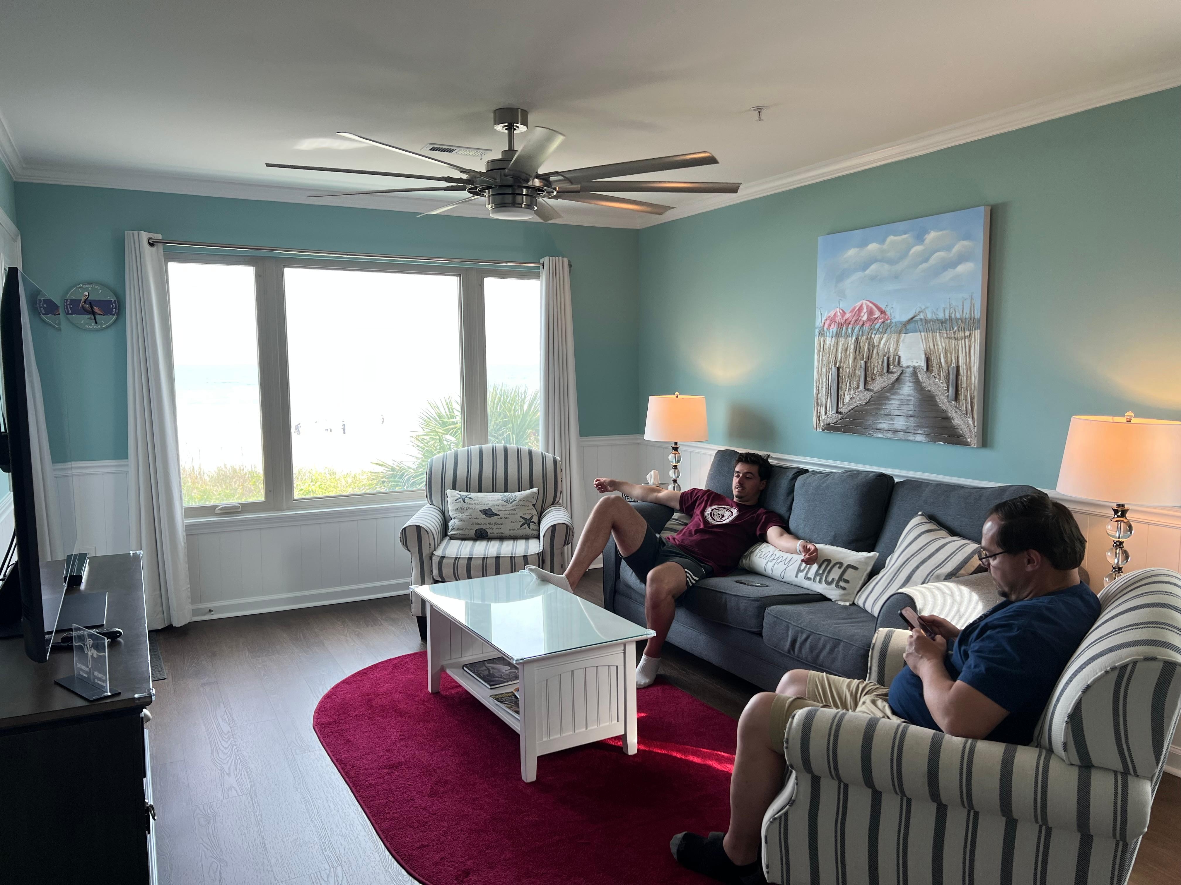 Such a comfy living room with a breathtaking view of the ocean