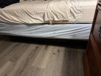 Blood stains on box spring cover.