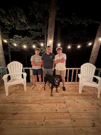 Hanging out on the back deck while cooking out on the grill.