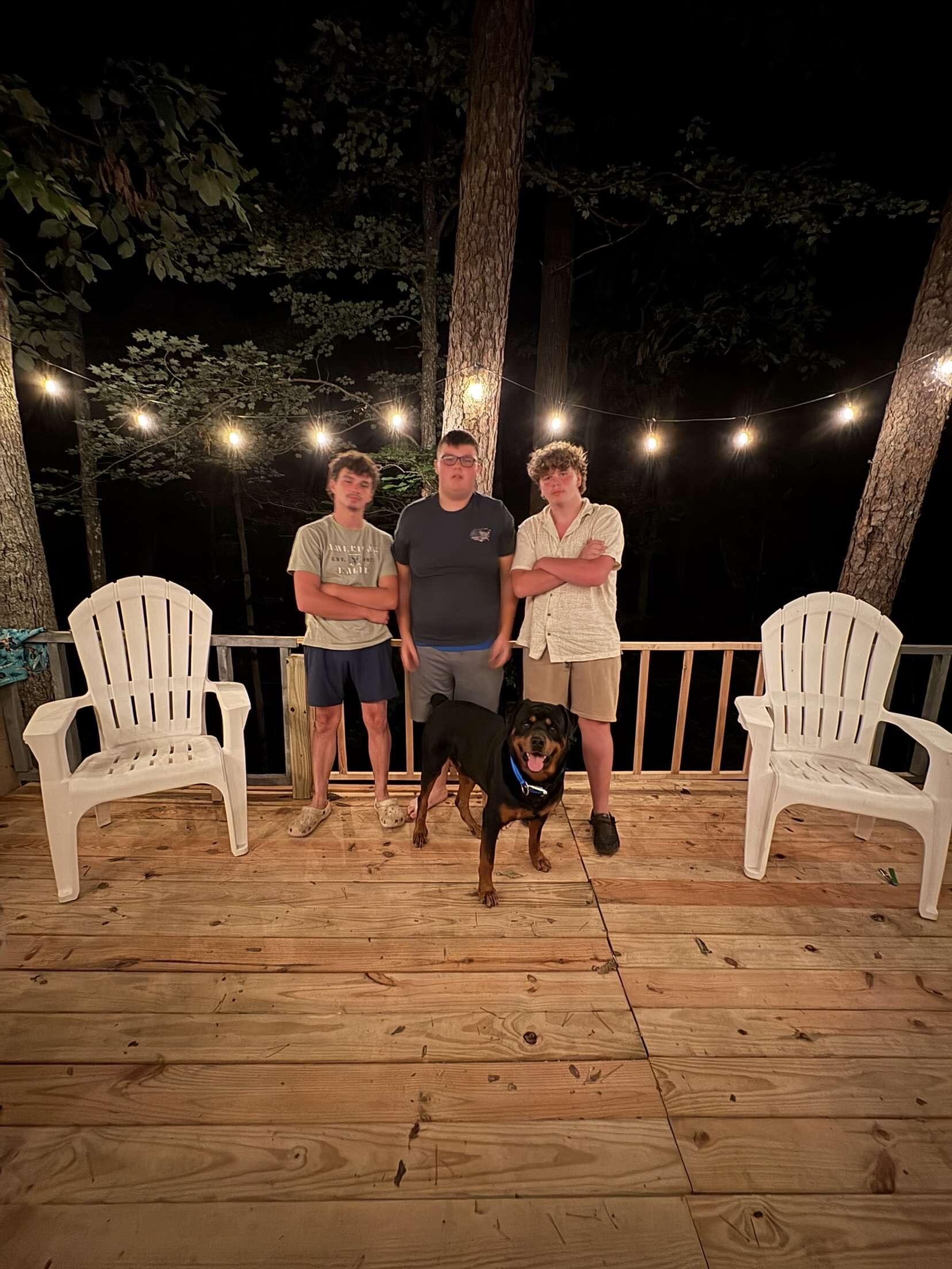 Hanging out on the back deck while cooking out on the grill. 