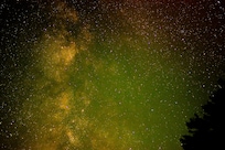I could see the milky way as soon as I stepped out the door to the deck at night and managed to capture some auroras as well while taking a photo of it