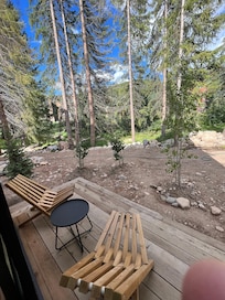 chairs leaning way back on porch