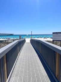 Walk from condo to beach.