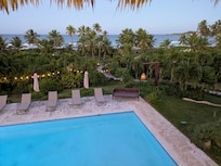 View from upper level of hotel across pool and property