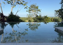 Early morning view of the pool and its' reflection.