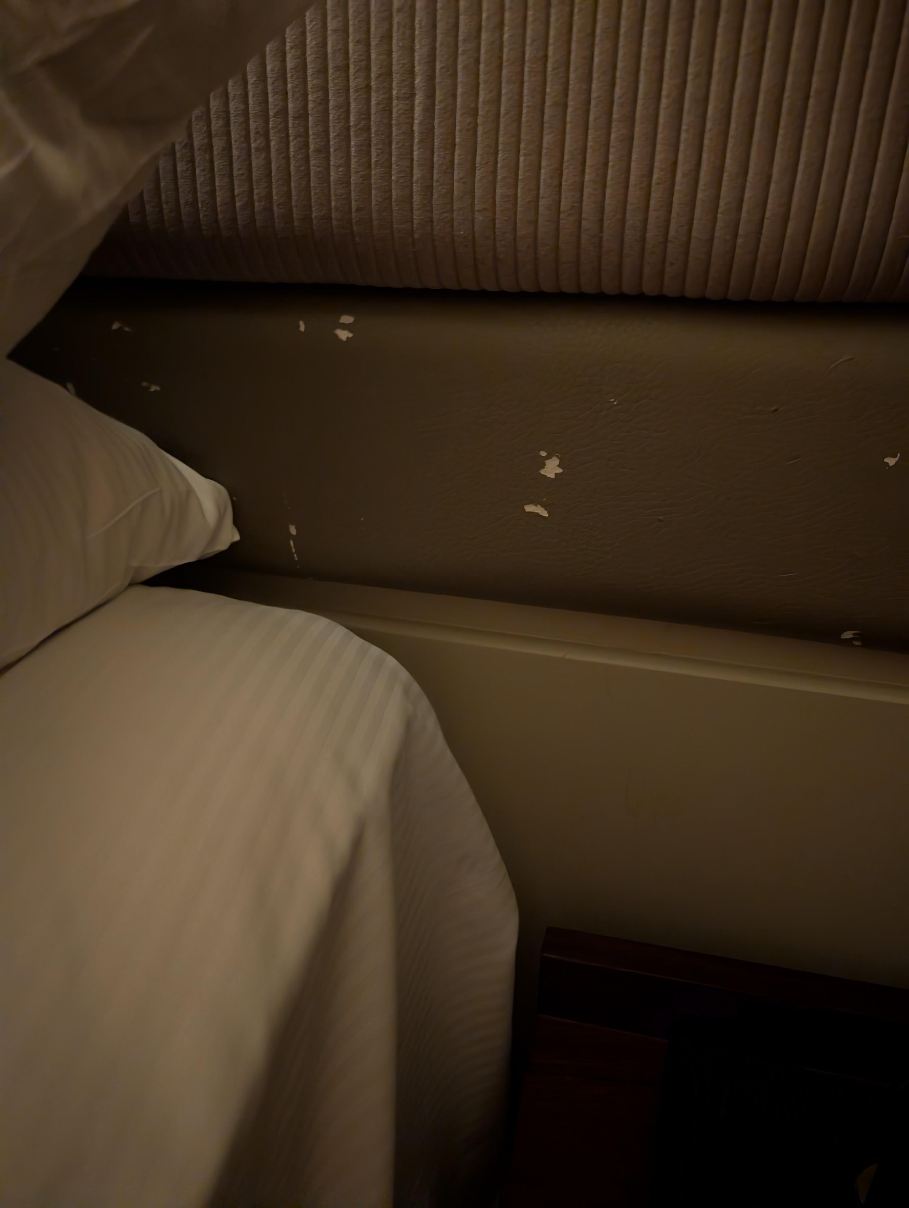 Bits of headboard missing/ damaged.