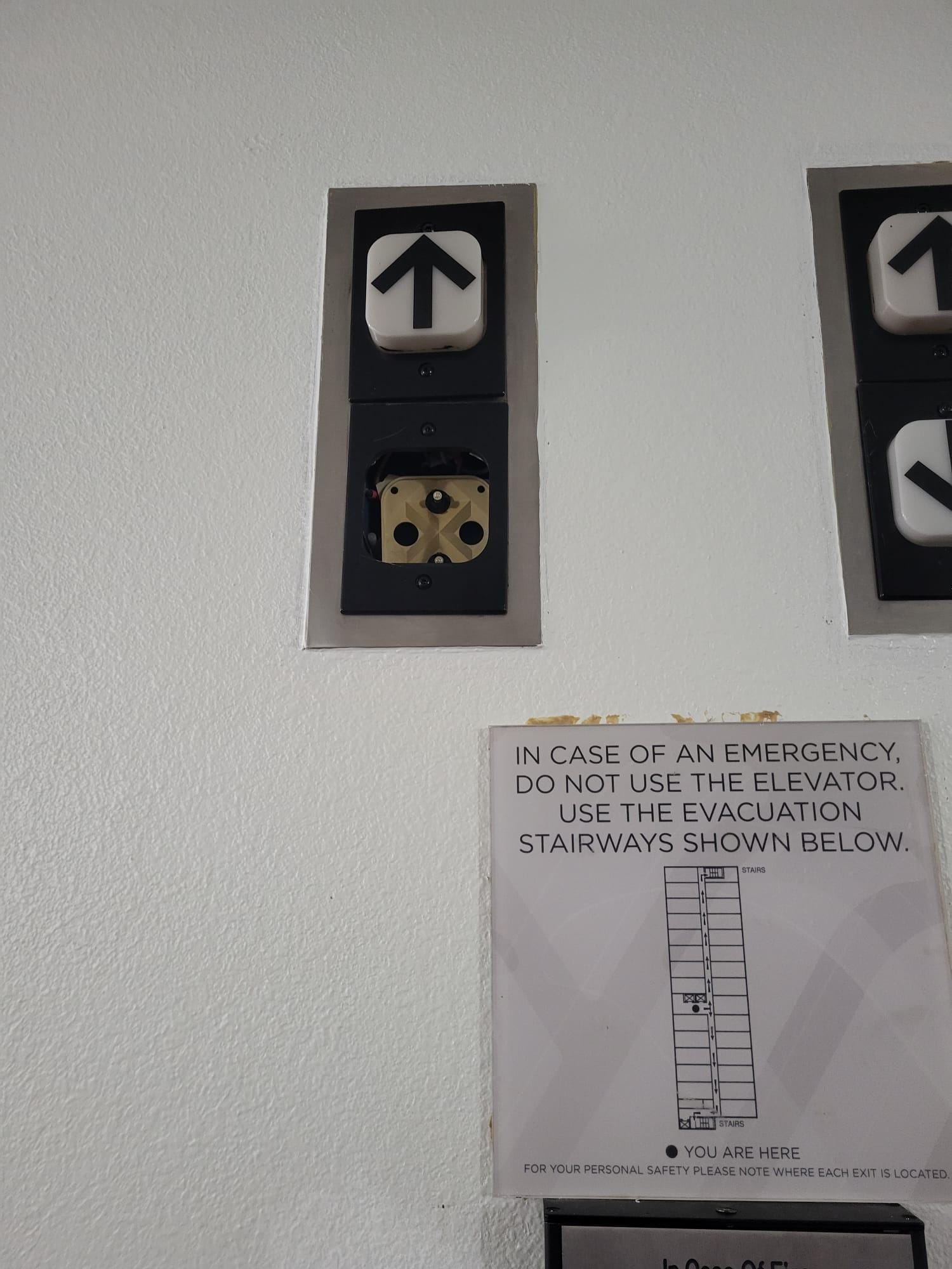 The elevator is missing indicator covers and they don't light up.