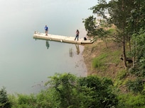 Boys fishing at the pier