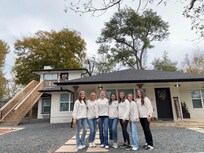 In front of the house!