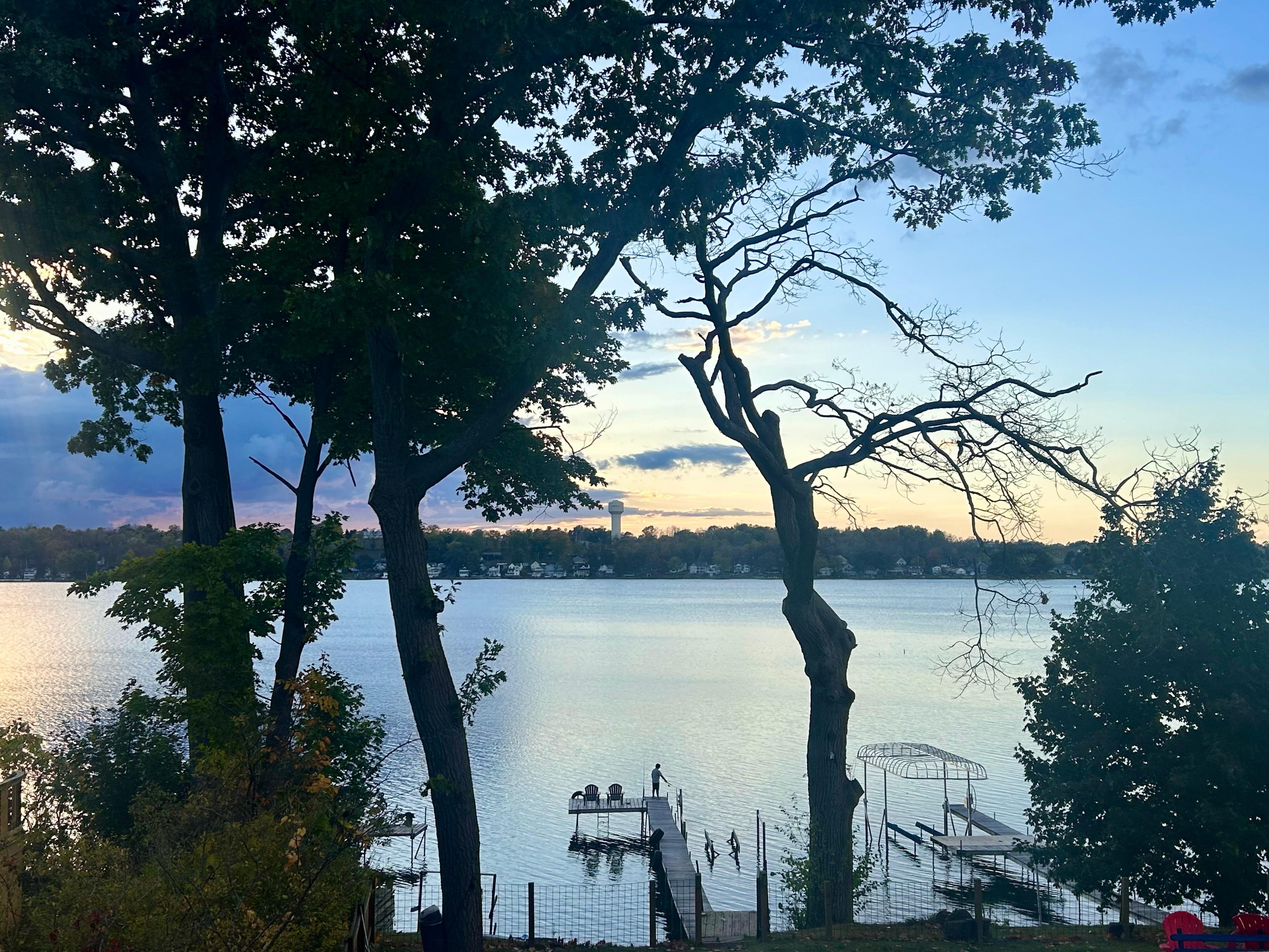 My son fishing off the dock in the evening. So peaceful!