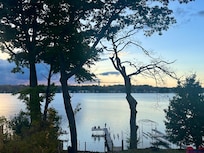 My son fishing off the dock in the evening. So peaceful!