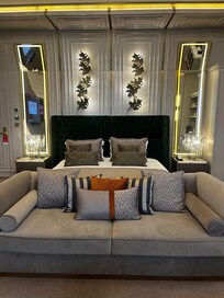 A beautiful bed in the Presidential Suite
