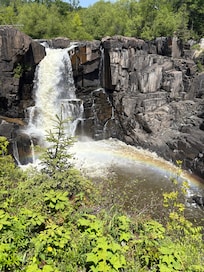 The high falls at the Pigeon River at Grand Portage… with rainbow at base