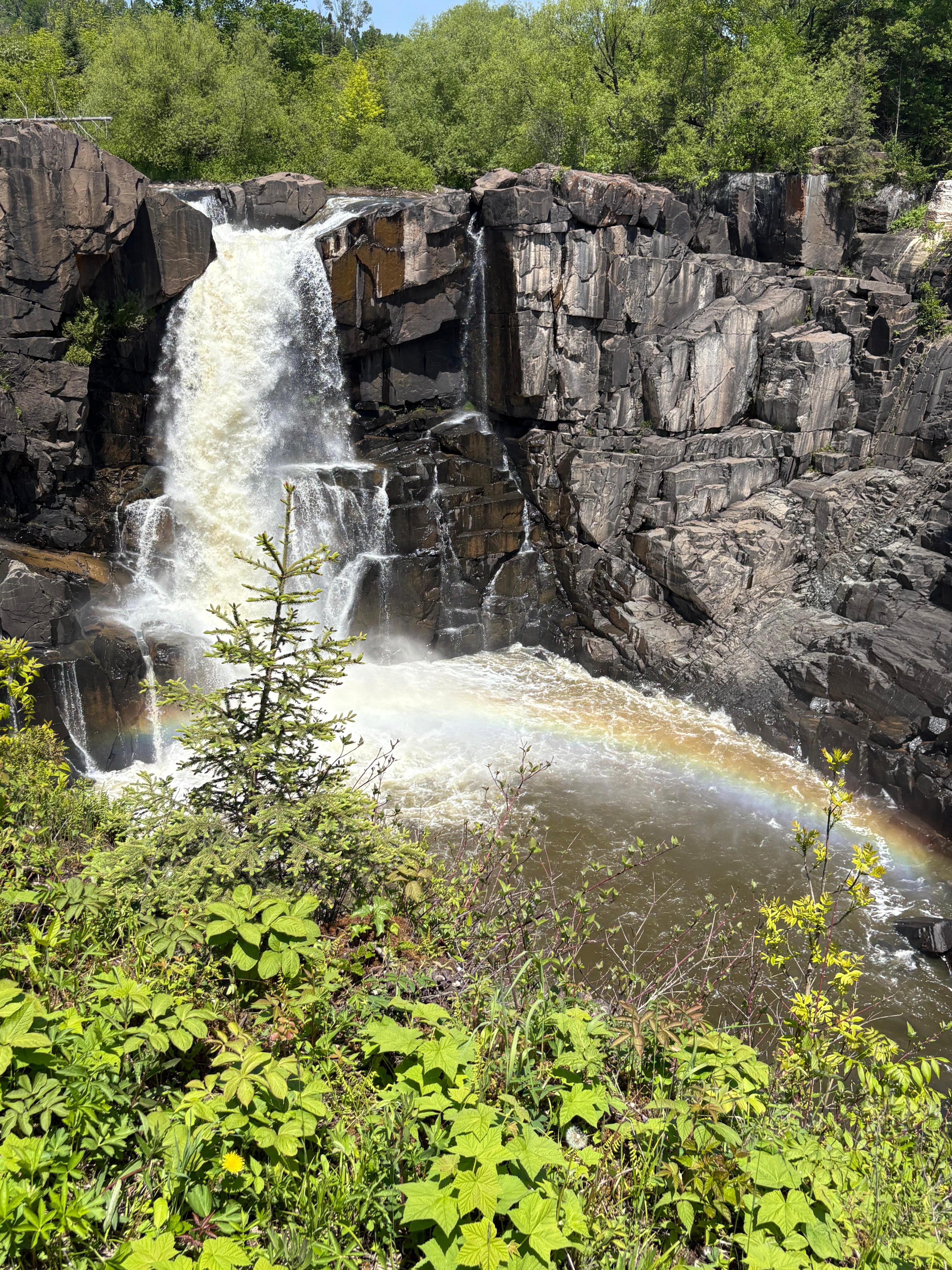 The high falls at the Pigeon River at Grand Portage… with rainbow at base