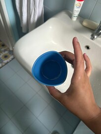 Dirty toothbrush cup