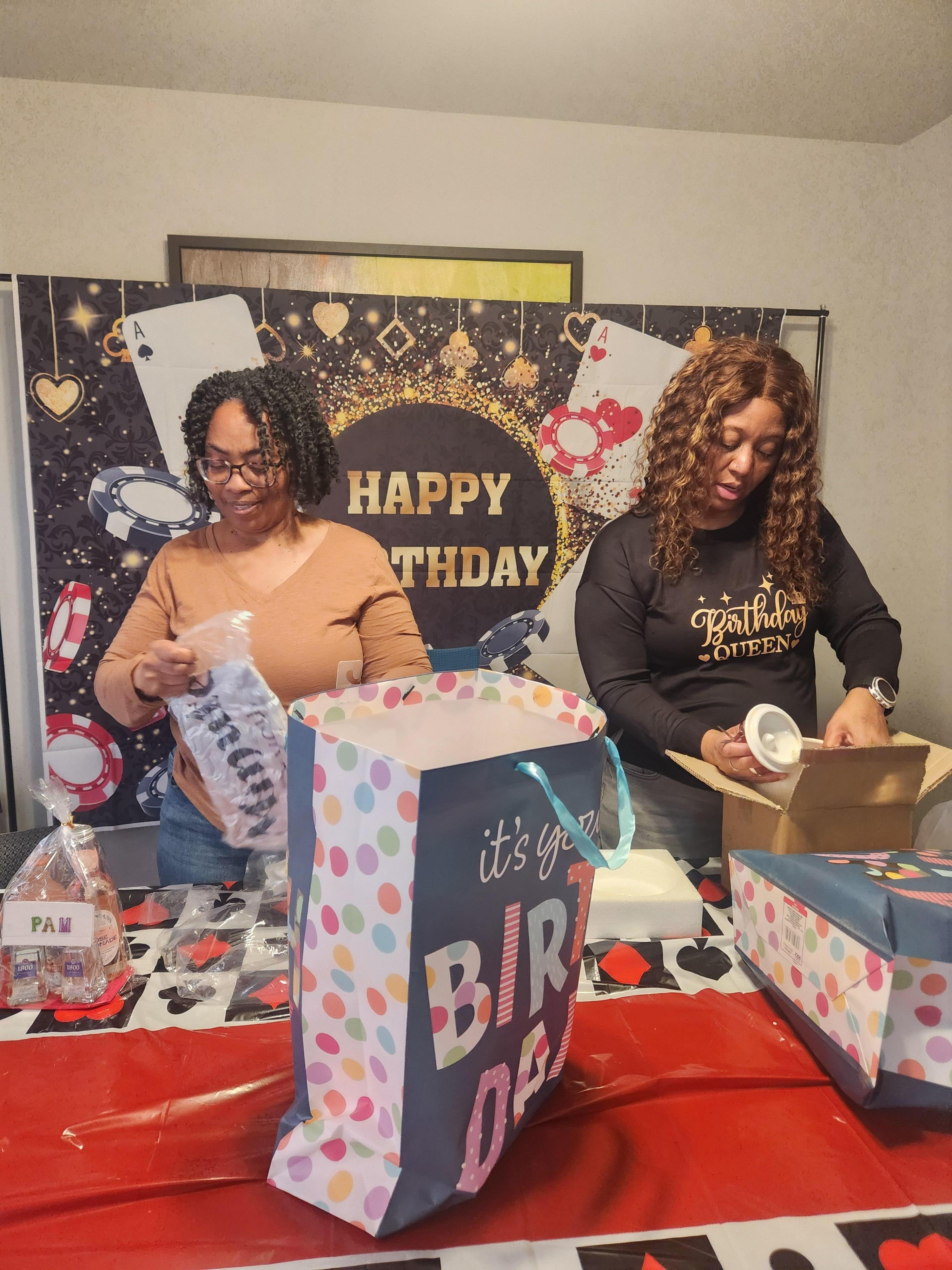 Birthday girls opening their gifts. 
