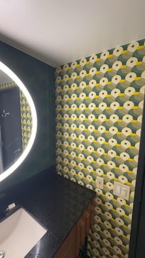 Cute wallpaper in the bathroom. Very clean and there were plenty of toiletries and towels.
