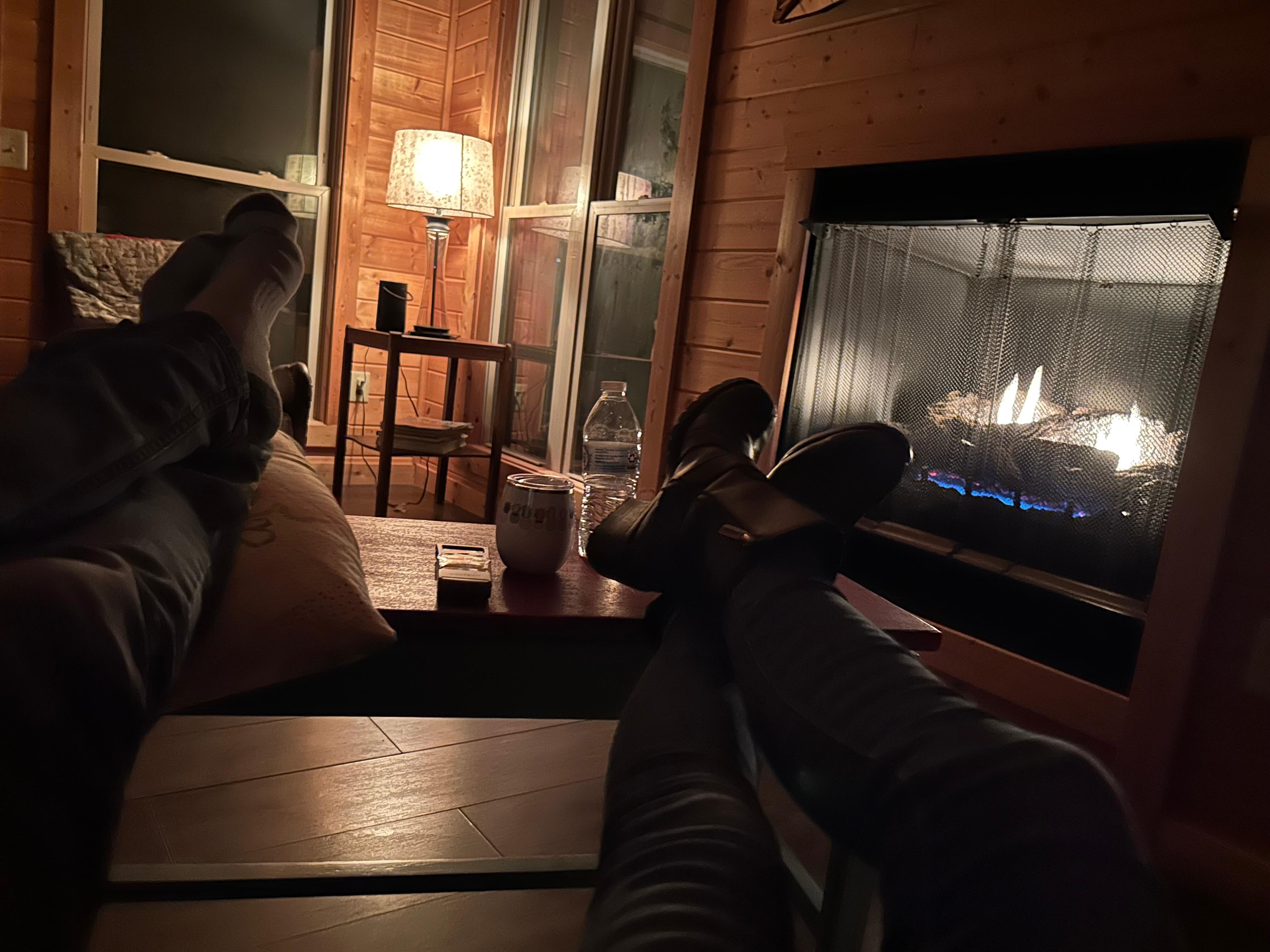 Staying warm by the fireplace 