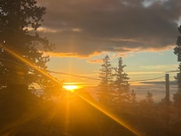 Morning sunrise out of living room windows.