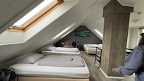 Spacious room with 4 beds and kitchen