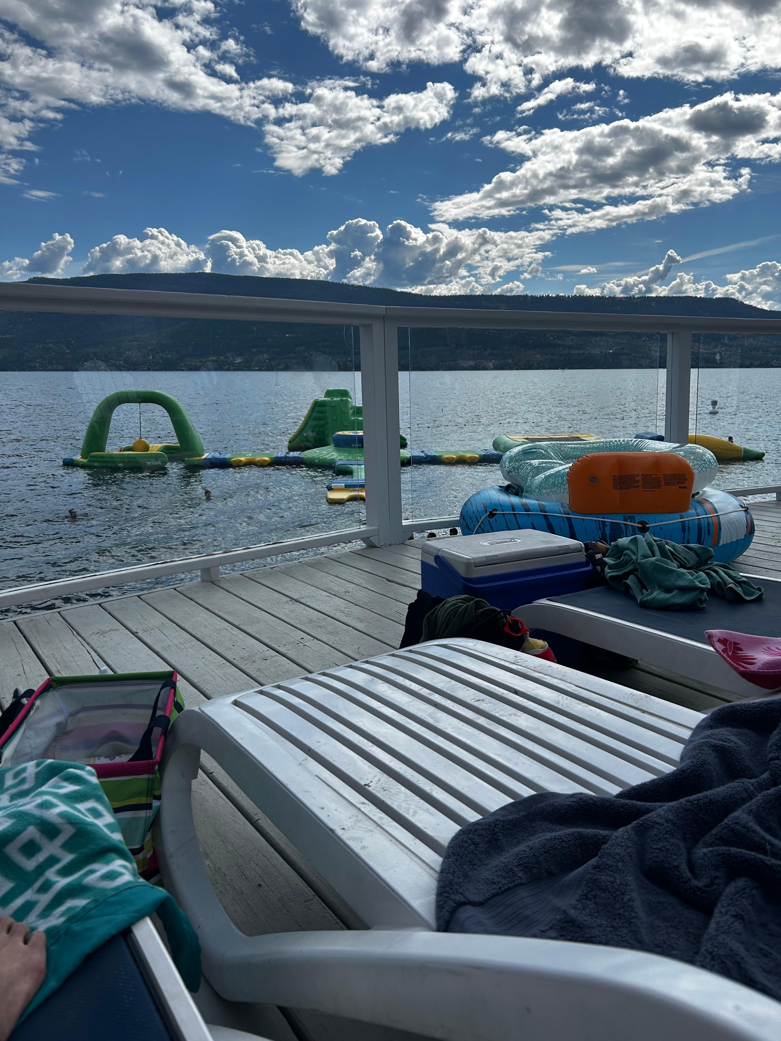 From the lakeshore lots of chairs available to lounge on. 
