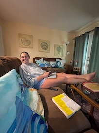 My granddaughter doing her online class on y’all’s comfy couch!