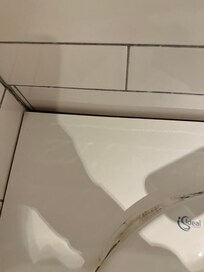 Bathroom sink unit hanging off the wall.