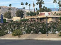 View of pool from driveway- just across street
