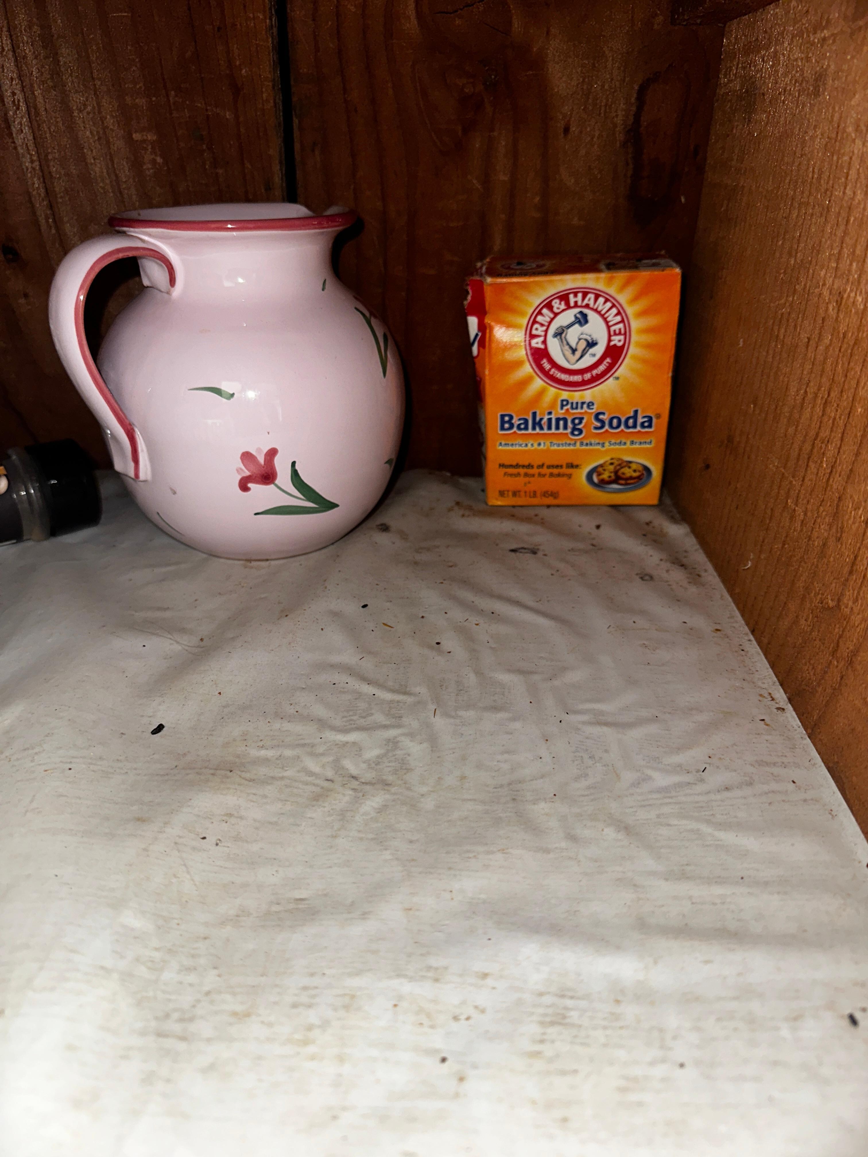 The pantry shelf after the cleaner had come. 