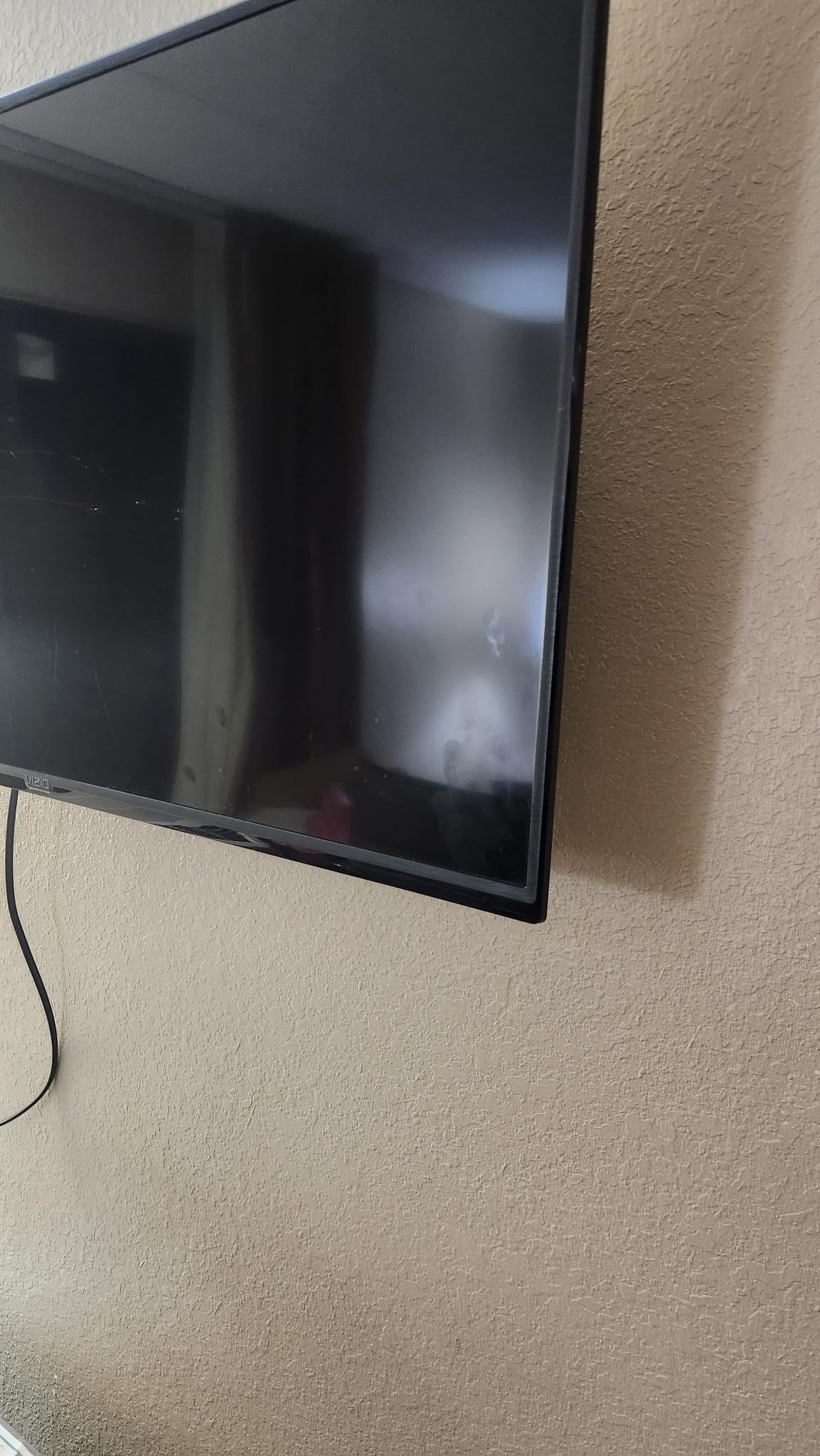 Greasy handprints on tv