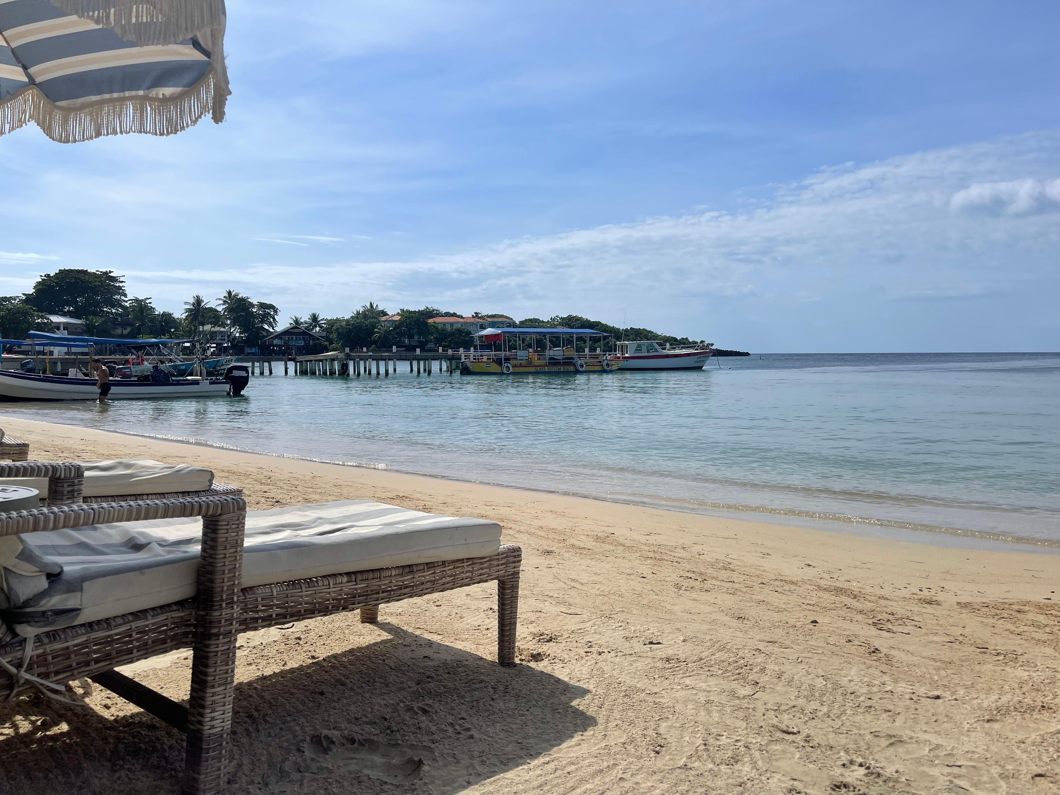 Beach lounger. Calm water. Bring a floatie!