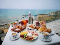 Breakfast (10 euros per person and brought to your room at the desired time)