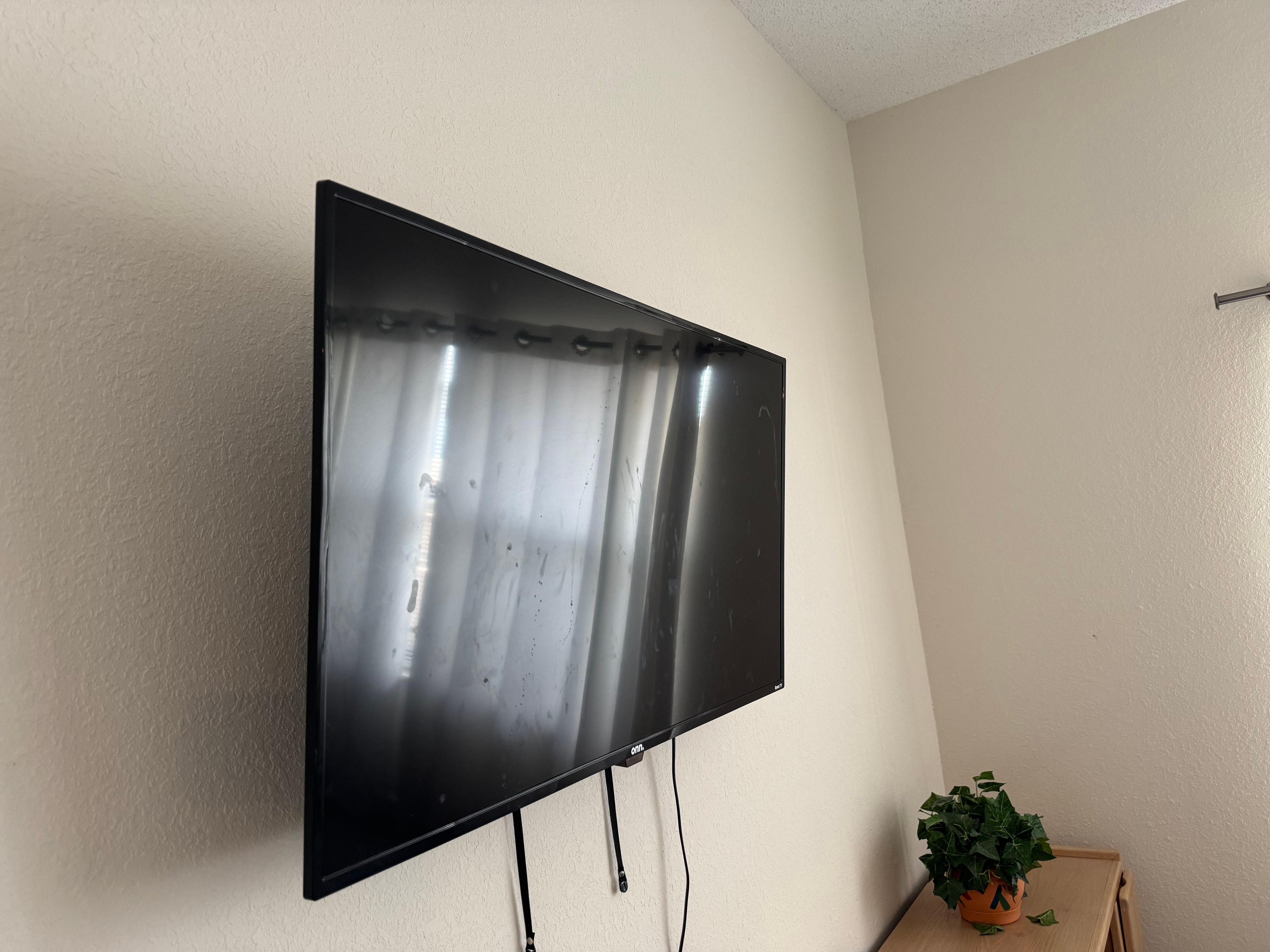 TV has hand prints all over it along with something else and I will let someone else use their imagination on the substance. 