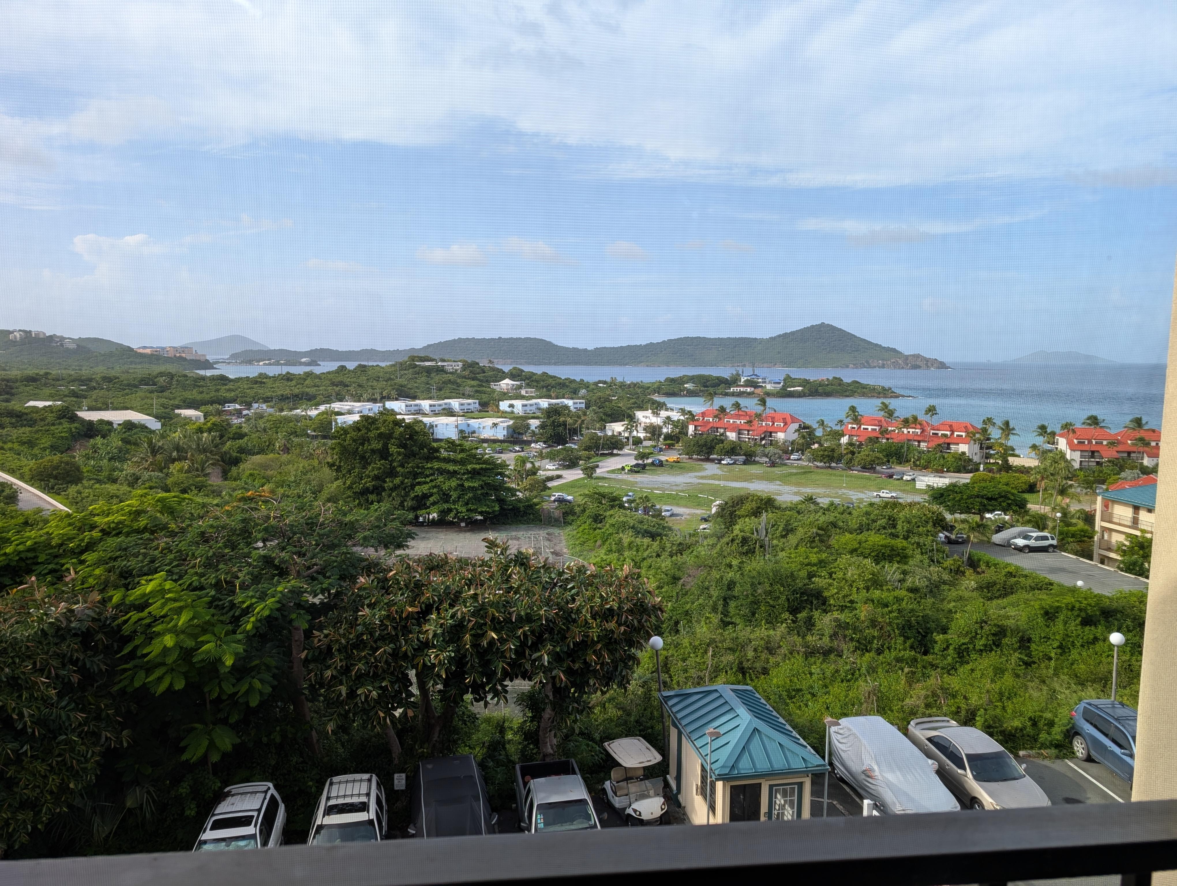 The white building next to the red rood buildings is a coffee shop and bar/grille with beach access.  5 minute walk if you take you time :)
