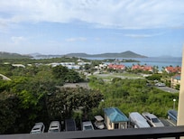 The white building next to the red rood buildings is a coffee shop and bar/grille with beach access.  5 minute walk if you take you time :)
