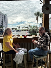 Enjoying breakfast and a morning cocktail across the street at Neal and Pam’s.
