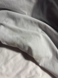 Pull up matching dirty marks on top and bottom sheet