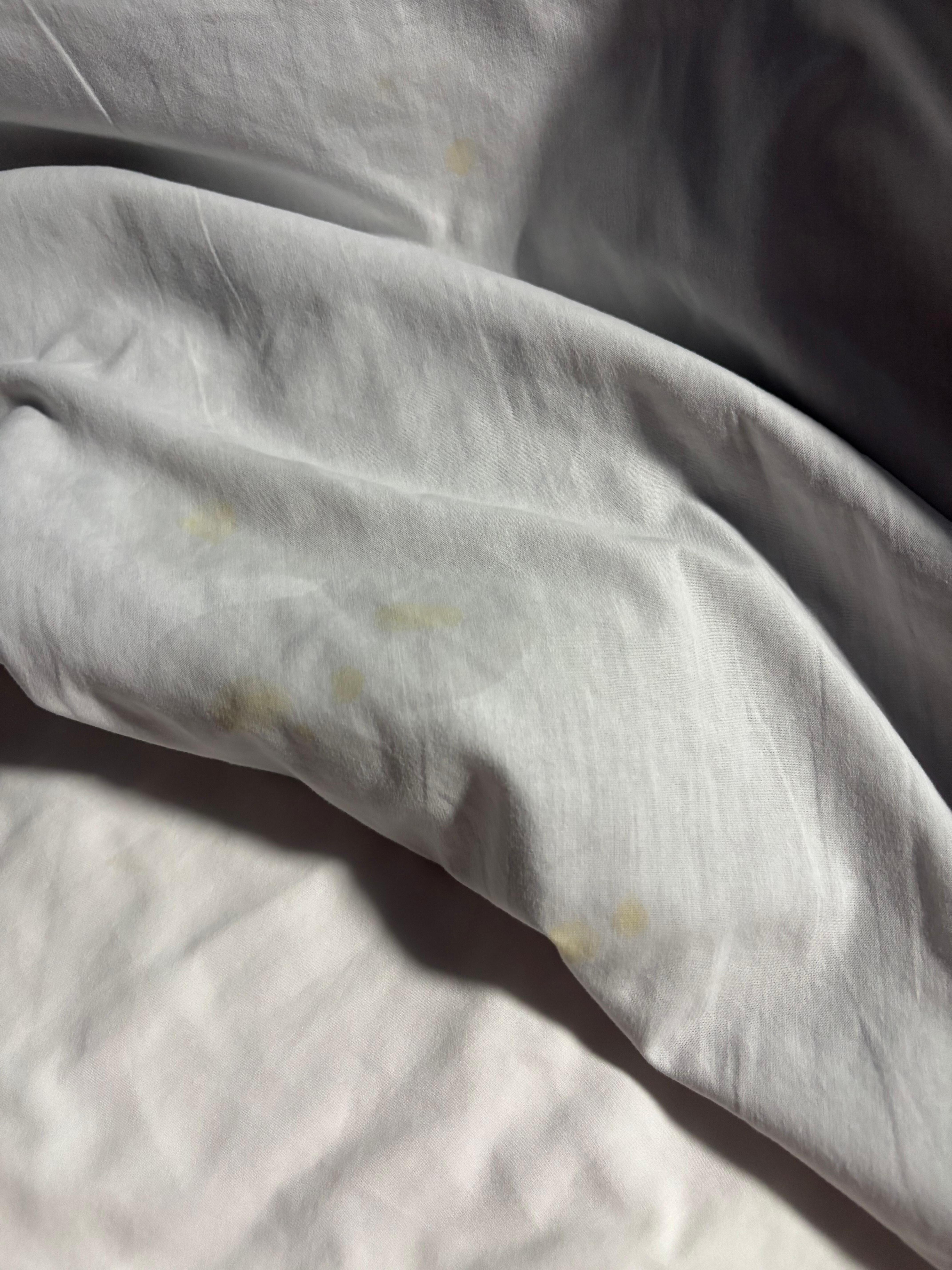 Pull up matching dirty marks on top and bottom sheet
