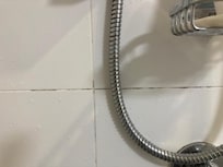 Shower cubicle needs mould removed.