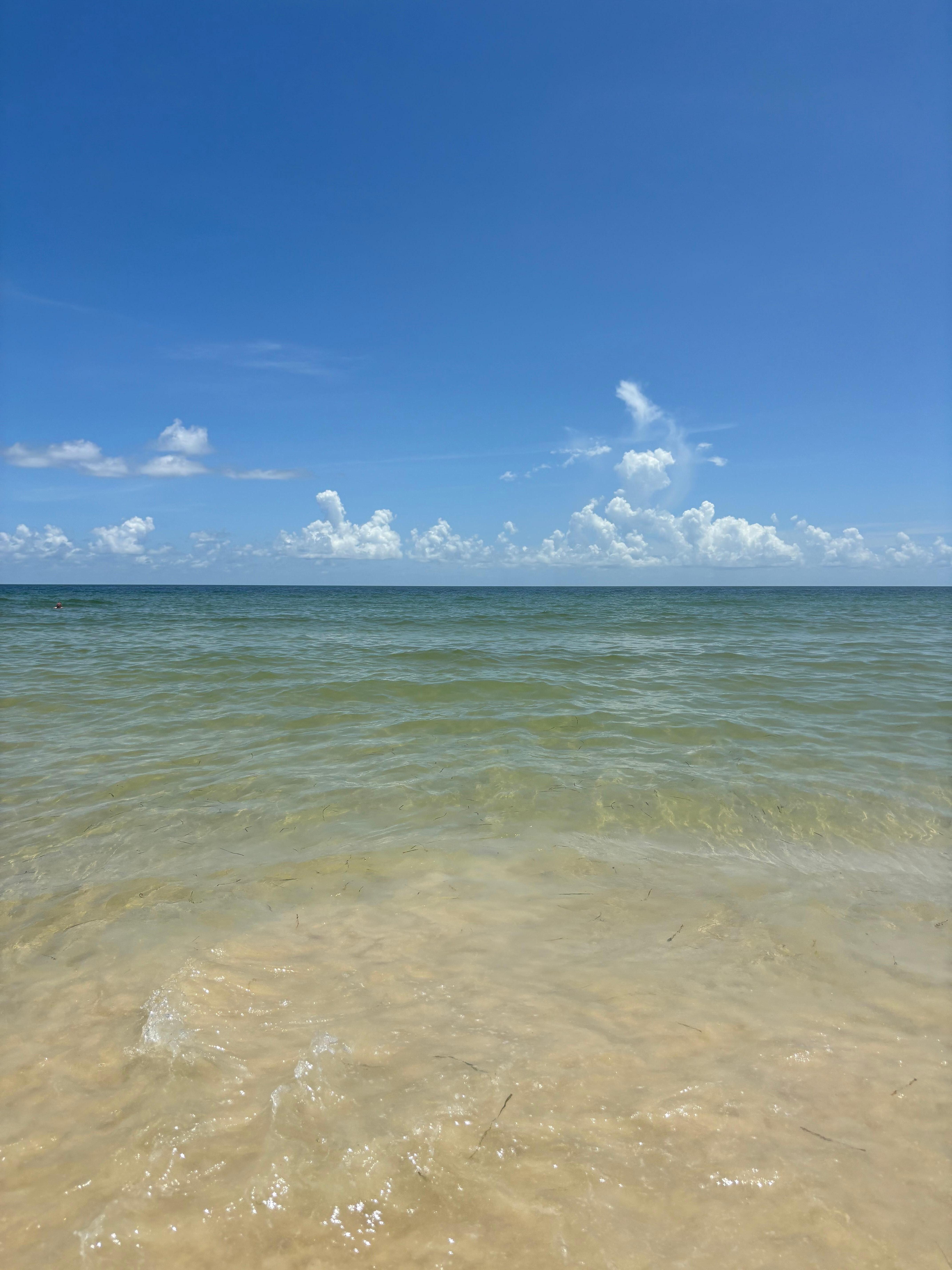 Less than a 3 minute walk to the clean beach with clear waters!