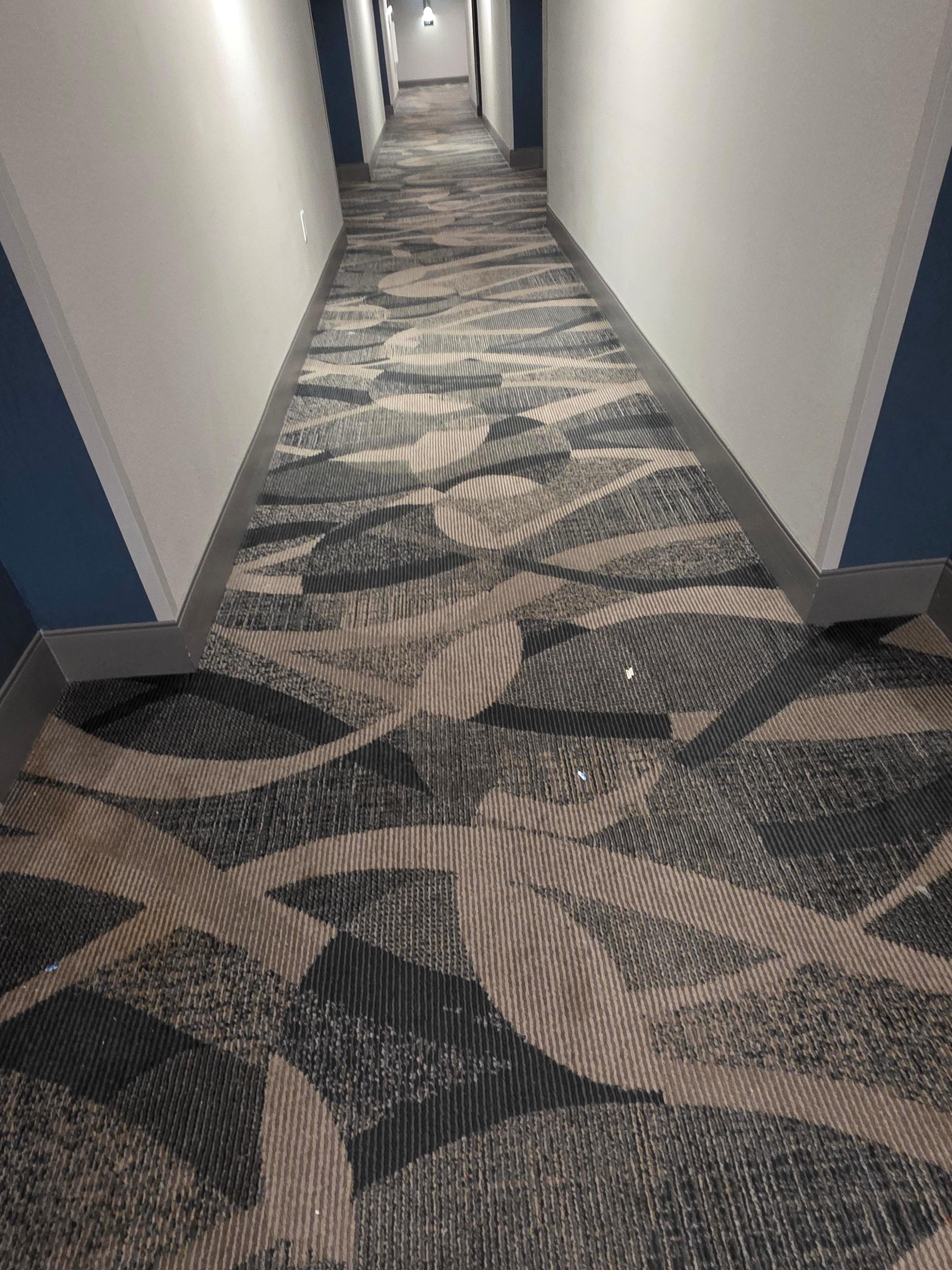 Faded and soiled with debris end to end on third floor