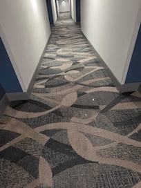 Faded and soiled with debris end to end on third floor