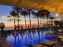 Sunsets are beautiful to see during dinner.