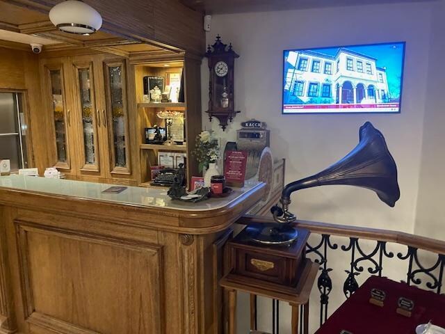 The hotel lobby -- the ancient gramophone and, behind it, an equally antiquated typewriter, are part of the hotel's ambience -- to give a sense of history.
