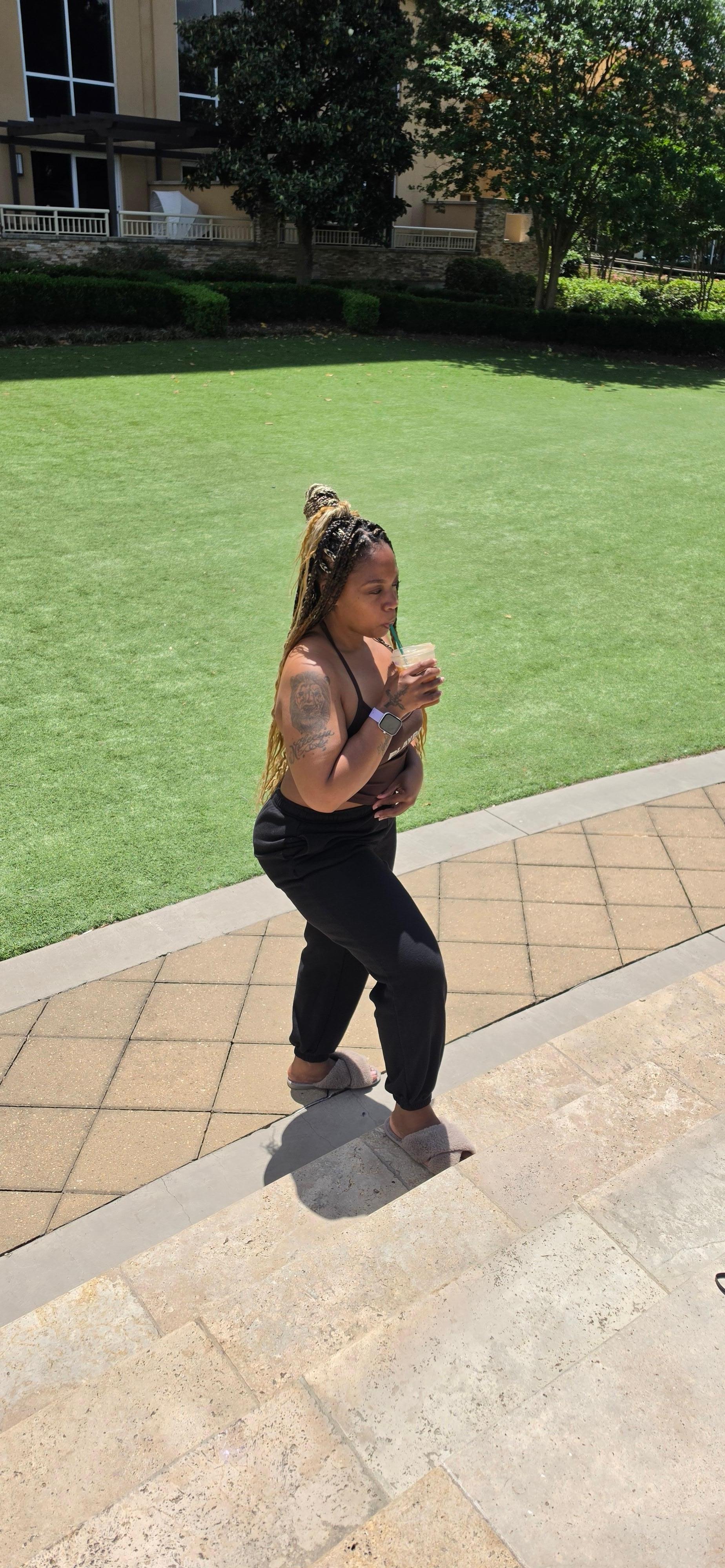 Outside by the boardwalk area taking a walk having coffee 