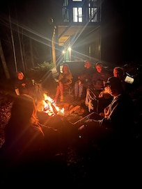 Grouped around the fire pit