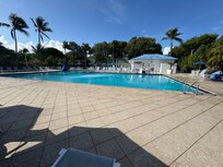 Amazingly large pool with music and a bar/grill