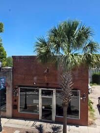 View from window down to the restaurant across the street