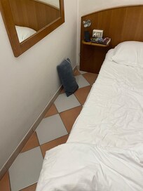 Bed left little space, and was incredibly low-difficult to get in and out of.