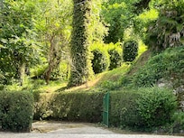 Walking behind the residence.